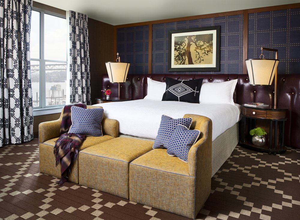 This deluxe guestroom at the Kimpton RivePlace Hotel tells the story of quality and patients of Blodgett Dental Care receive 20% off hotel room rates